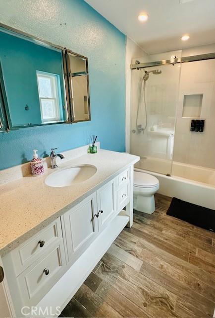 6080 Cape Cod Ln Unit 54, Yorba Linda, CA 92887 - full bath with wood finished floors, vanity, bathtub / shower combination, and recessed lighting