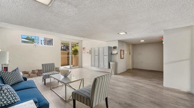 1115 Cordova St Unit 207, Pasadena, CA 91106 - living room with a textured ceiling and wood finished floors