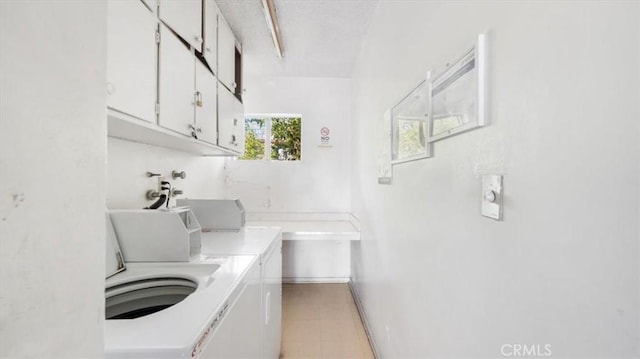 1115 Cordova St Unit 207, Pasadena, CA 91106 - laundry area featuring cabinet space and washing machine and dryer