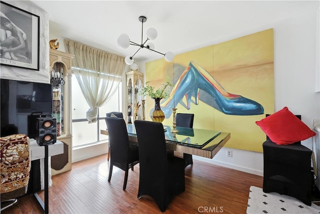 1750 Camino Palmero St Unit 539, Los Angeles, CA 90046 - dining room featuring a chandelier, healthy amount of natural light, and wood finished floors