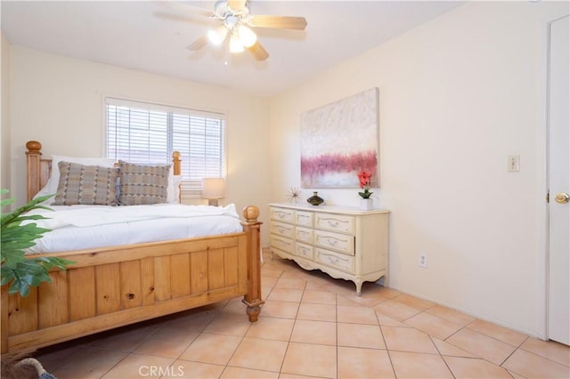 8825 Sophia Ave, North Hills, CA 91343 - bedroom featuring a ceiling fan and light tile patterned flooring