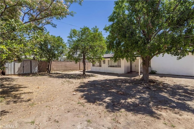 8825 Sophia Ave, North Hills, CA 91343 - view of yard featuring a shed