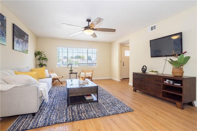 8825 Sophia Ave, North Hills, CA 91343 - living room with wood finished floors and a ceiling fan