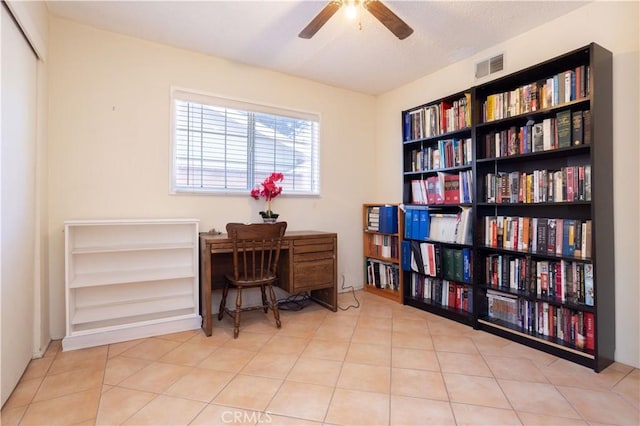 8825 Sophia Ave, North Hills, CA 91343 - office area with ceiling fan and tile patterned flooring