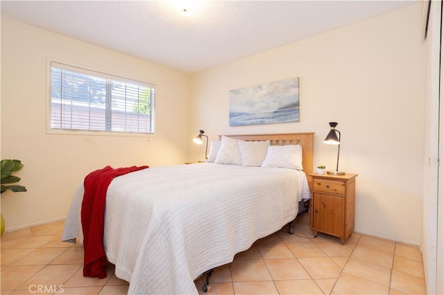 8825 Sophia Ave, North Hills, CA 91343 - bedroom with light tile patterned floors