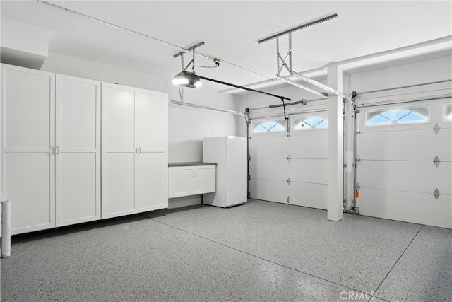 20455 Via Canarias, Yorba Linda, CA 92887 - garage featuring freestanding refrigerator and a garage door opener