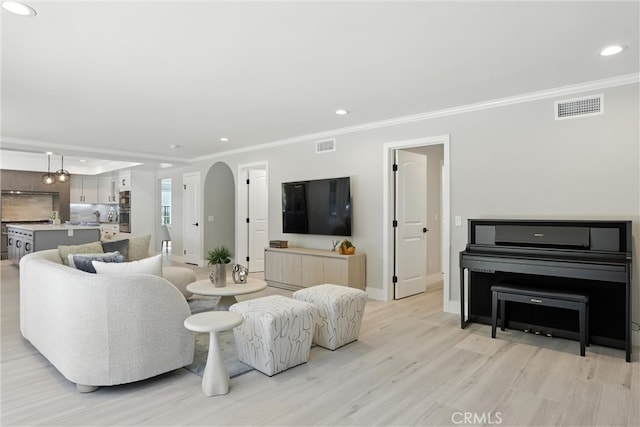 20455 Via Canarias, Yorba Linda, CA 92887 - living room with recessed lighting, ornamental molding, light wood-style flooring, and arched walkways