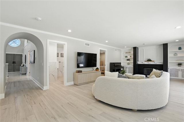 20455 Via Canarias, Yorba Linda, CA 92887 - living area with crown molding, recessed lighting, light wood-style floors, and arched walkways
