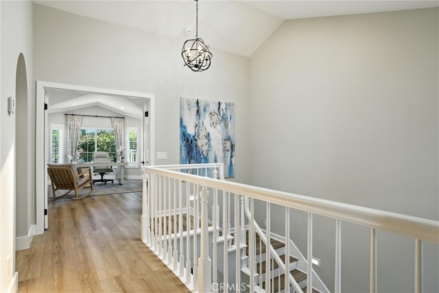 20455 Via Canarias, Yorba Linda, CA 92887 - corridor featuring lofted ceiling, an upstairs landing, light wood-style flooring, and a chandelier