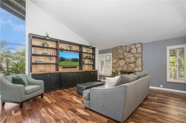 25632 Adriana St, Mission Viejo, CA 92691 - living area with dark wood finished floors, lofted ceiling, a fireplace, and healthy amount of natural light