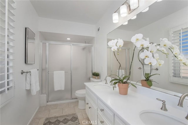 25632 Adriana St, Mission Viejo, CA 92691 - full bathroom featuring double vanity, a stall shower, and tile patterned floors