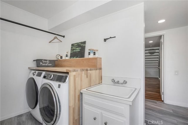 25632 Adriana St, Mission Viejo, CA 92691 - washroom featuring washer and dryer, recessed lighting, and wood finished floors