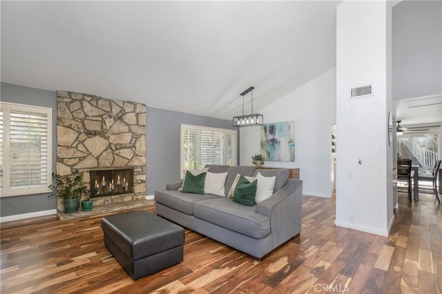 25632 Adriana St, Mission Viejo, CA 92691 - living room featuring wood finished floors, plenty of natural light, a fireplace, and high vaulted ceiling