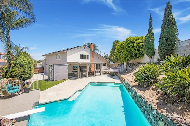 25632 Adriana St, Mission Viejo, CA 92691 - view of swimming pool with a patio, a fenced backyard, and a diving board
