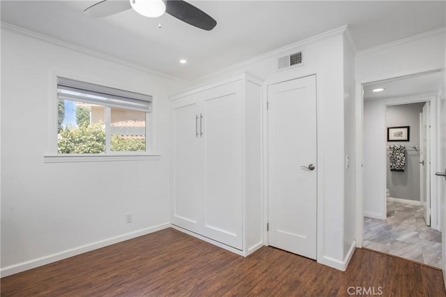 25632 Adriana St, Mission Viejo, CA 92691 - unfurnished bedroom featuring crown molding, dark wood-type flooring, recessed lighting, ceiling fan, and a closet