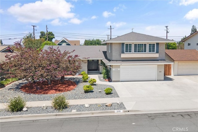 2115 Kathryn Way, Placentia, CA 92870 - view of front facade featuring stucco siding, concrete driveway, an attached garage, and a shingled roof