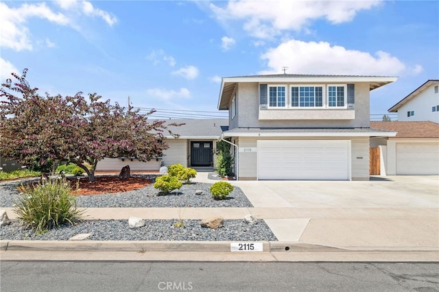2115 Kathryn Way, Placentia, CA 92870 - traditional-style house featuring driveway, an attached garage, and stucco siding