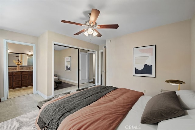 2115 Kathryn Way, Placentia, CA 92870 - bedroom with light colored carpet, a closet, ensuite bathroom, and a ceiling fan