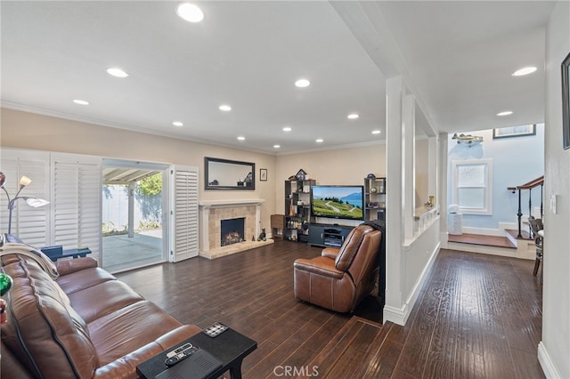 2115 Kathryn Way, Placentia, CA 92870 - living area featuring a stone fireplace, ornamental molding, dark wood-style flooring, and recessed lighting
