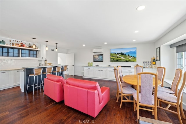 2115 Kathryn Way, Placentia, CA 92870 - living area featuring wet bar, recessed lighting, dark wood-type flooring, and an AC wall unit