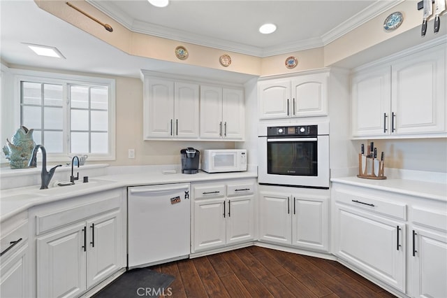 2115 Kathryn Way, Placentia, CA 92870 - kitchen with white appliances, white cabinets, light countertops, and crown molding