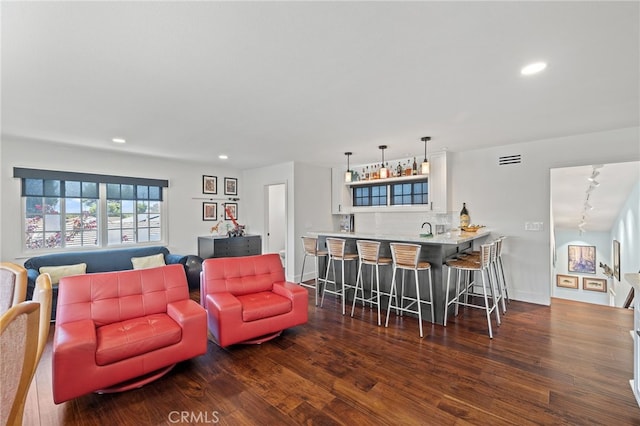 2115 Kathryn Way, Placentia, CA 92870 - living room with dark wood-style flooring, wet bar, recessed lighting, and rail lighting
