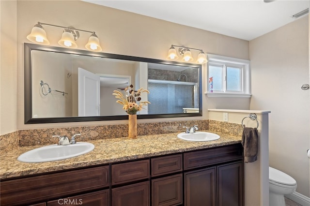 2115 Kathryn Way, Placentia, CA 92870 - bathroom with double vanity and a shower with shower door