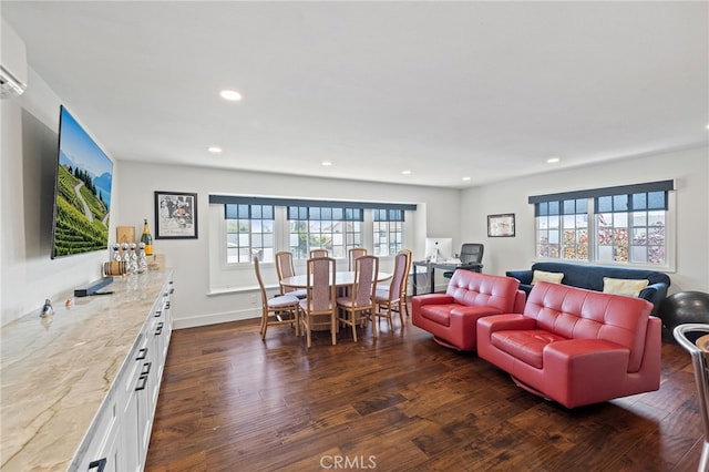 2115 Kathryn Way, Placentia, CA 92870 - living area with dark wood-style flooring, recessed lighting, a desk, and an AC wall unit