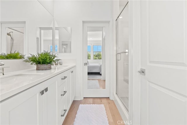 90 Harness Way, Rancho Mission Viejo, CA 92694 - full bath with double vanity, a shower stall, wood finished floors, and ensuite bathroom