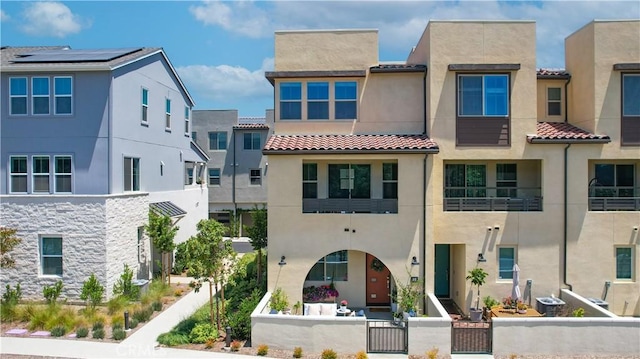 90 Harness Way, Rancho Mission Viejo, CA 92694 - view of front of property with a fenced front yard, stucco siding, a tiled roof, and a gate