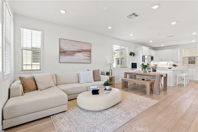 90 Harness Way, Rancho Mission Viejo, CA 92694 - living area featuring light wood-type flooring and recessed lighting
