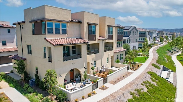 90 Harness Way, Rancho Mission Viejo, CA 92694 - view of building exterior with a residential view