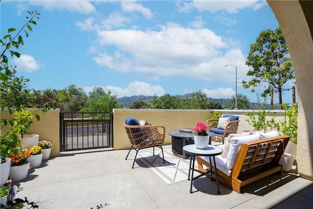 90 Harness Way, Rancho Mission Viejo, CA 92694 - view of patio featuring an outdoor living space and a mountain view