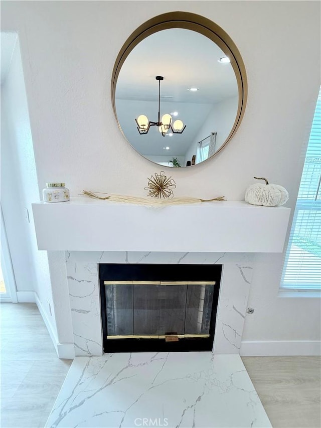 1421 Wildflower St, Rialto, CA 92377 - detailed view of a premium fireplace and a chandelier