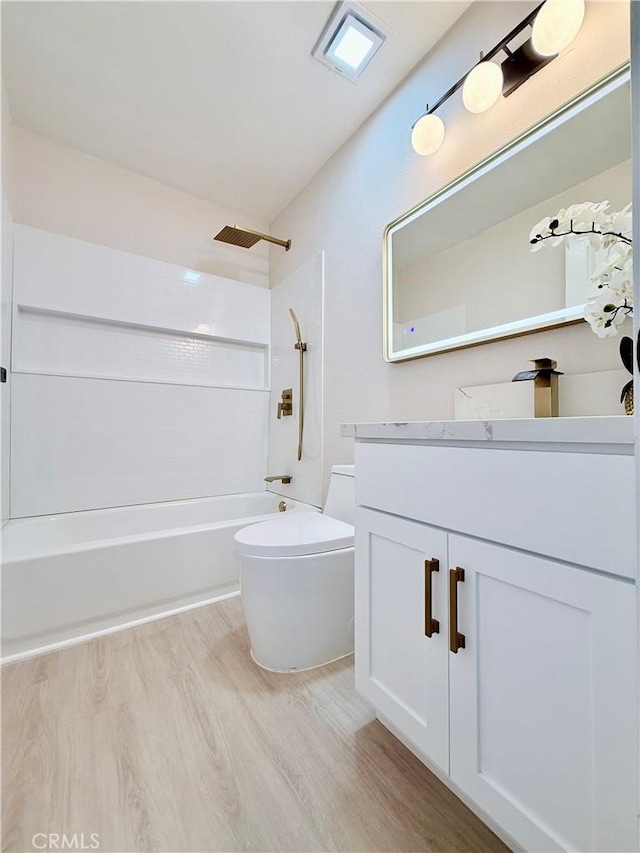 1421 Wildflower St, Rialto, CA 92377 - full bath with wood finished floors, bathing tub / shower combination, and vanity