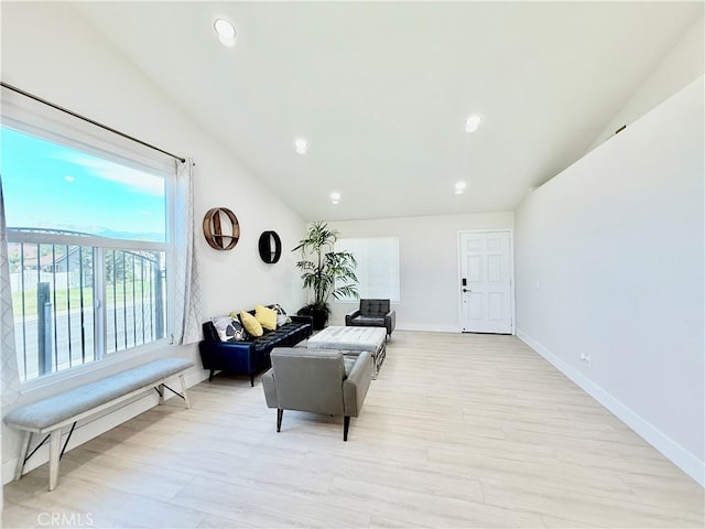 1421 Wildflower St, Rialto, CA 92377 - living area featuring vaulted ceiling, light wood-type flooring, and recessed lighting