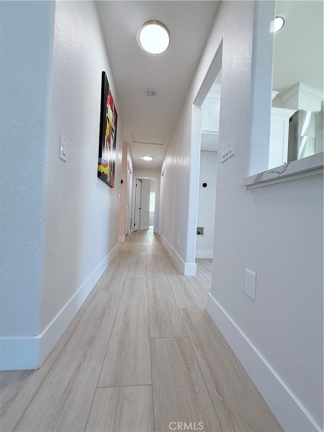 1421 Wildflower St, Rialto, CA 92377 - hall featuring wood finished floors and baseboards