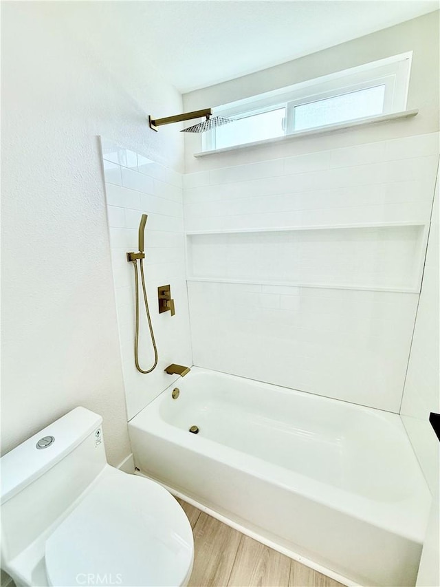 1421 Wildflower St, Rialto, CA 92377 - bathroom featuring washtub / shower combination and wood finished floors