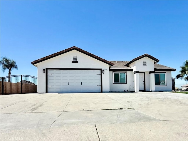 1421 Wildflower St, Rialto, CA 92377 - single story home featuring stucco siding, concrete driveway, and a tiled roof
