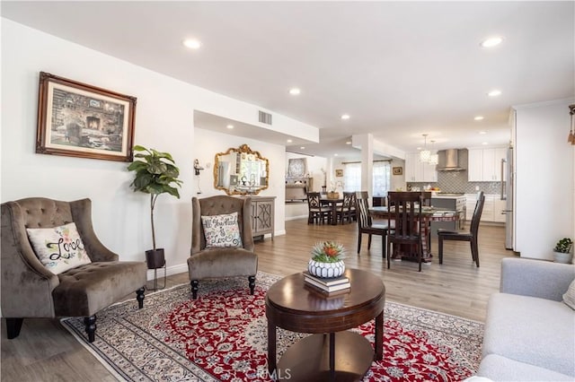 11721 Killimore Ave, Porter Ranch, CA 91326 - living area with recessed lighting and light wood-style flooring