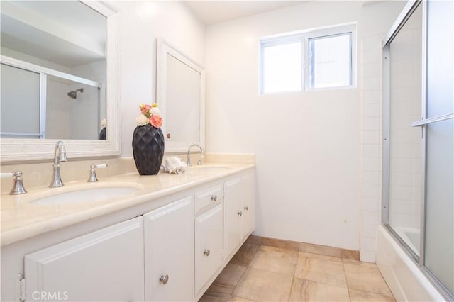 11721 Killimore Ave, Porter Ranch, CA 91326 - bathroom with double vanity and bath / shower combo with glass door
