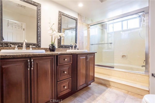 11721 Killimore Ave, Porter Ranch, CA 91326 - full bathroom with shower / bath combination with glass door, double vanity, and tile patterned floors