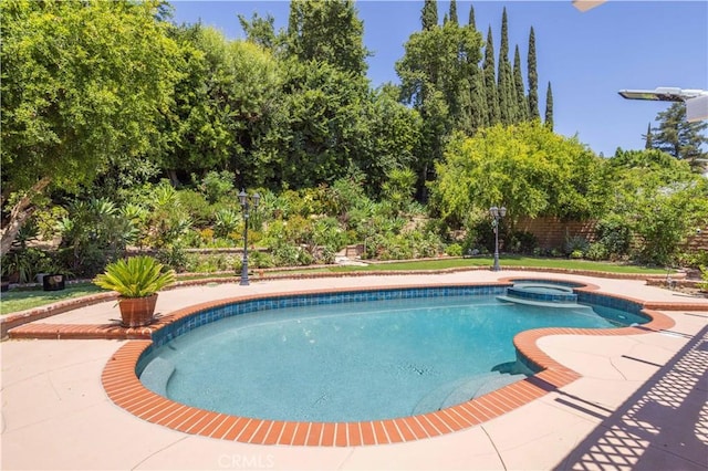 11721 Killimore Ave, Porter Ranch, CA 91326 - view of swimming pool featuring a pool with connected hot tub and a patio