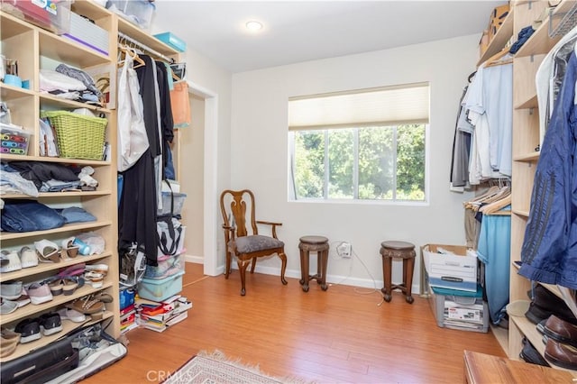 11721 Killimore Ave, Porter Ranch, CA 91326 - spacious closet featuring wood finished floors