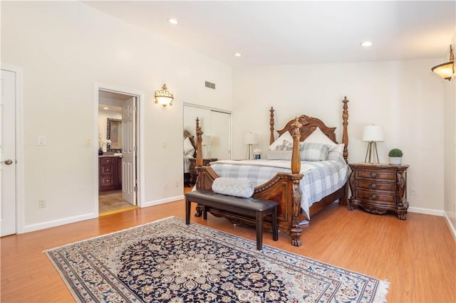 11721 Killimore Ave, Porter Ranch, CA 91326 - bedroom featuring light wood-type flooring, ensuite bathroom, and recessed lighting