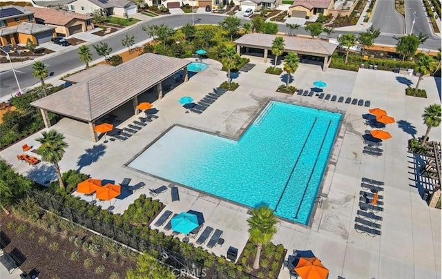 1415 Opal Ct, Beaumont, CA 92223 - aerial perspective of suburban area with a pool area