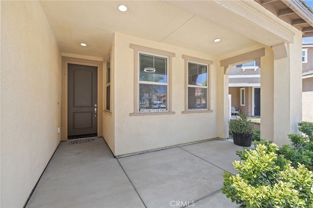 1415 Opal Ct, Beaumont, CA 92223 - view of exterior entry featuring stucco siding