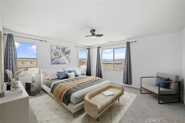 1415 Opal Ct, Beaumont, CA 92223 - bedroom with multiple windows, carpet floors, and ceiling fan