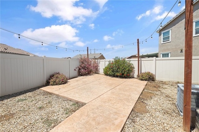 1415 Opal Ct, Beaumont, CA 92223 - fenced backyard with a patio