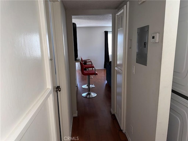 1549 W 146th St Unit 9, Gardena, CA 90247 - hallway with wood finished floors, electric panel, and a textured ceiling